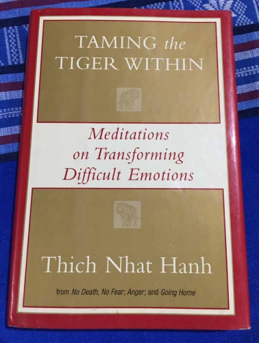 Taming the tiger within: Meditations on training difficult emotions by Thich Nhat Hanh